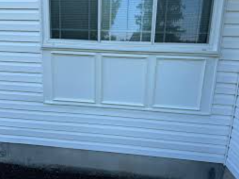 The Mismatched Siding Patch That Never Stopped Showing
